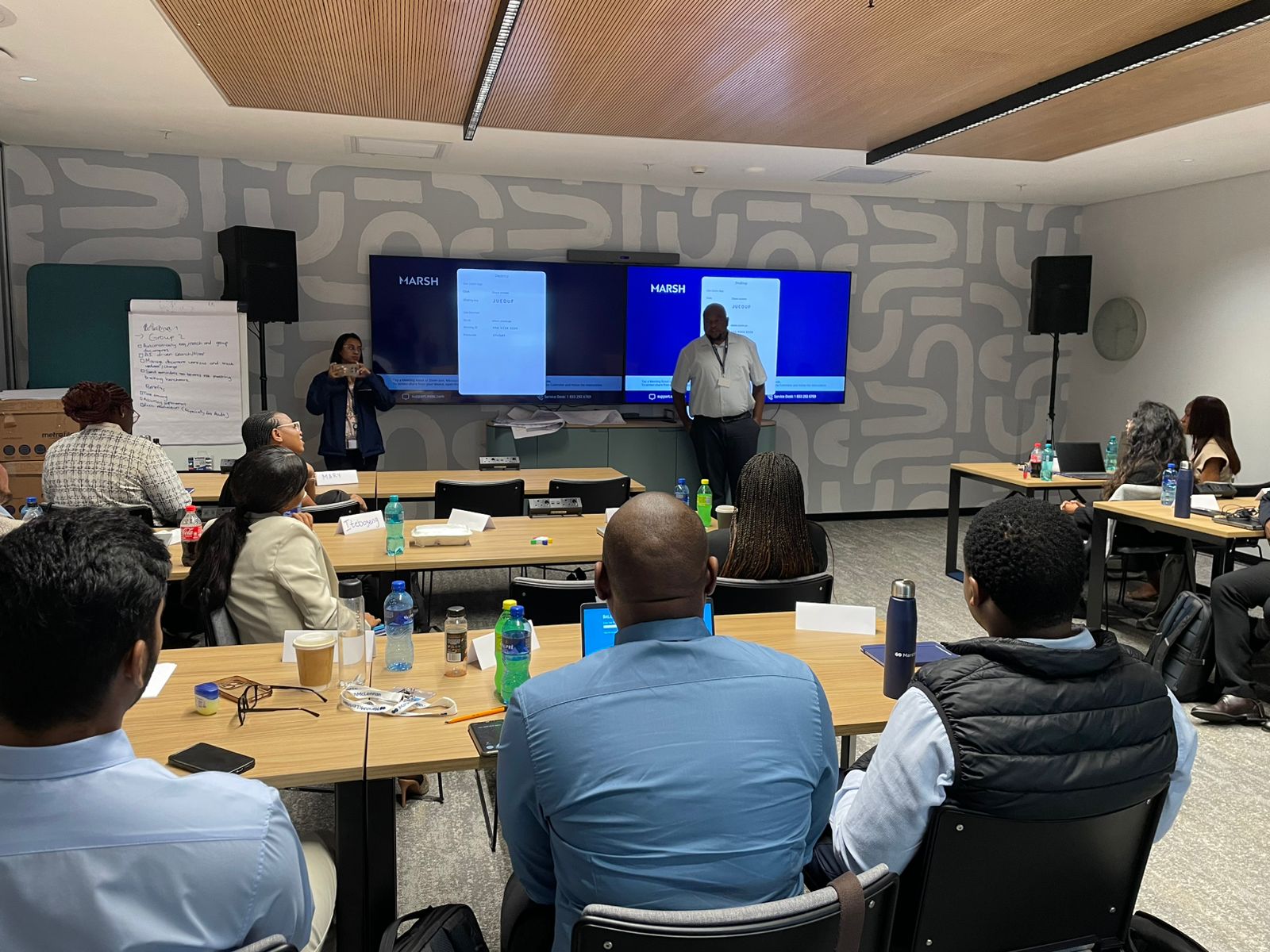 Black-led leadership workshop participants collaborating during a facilitation session