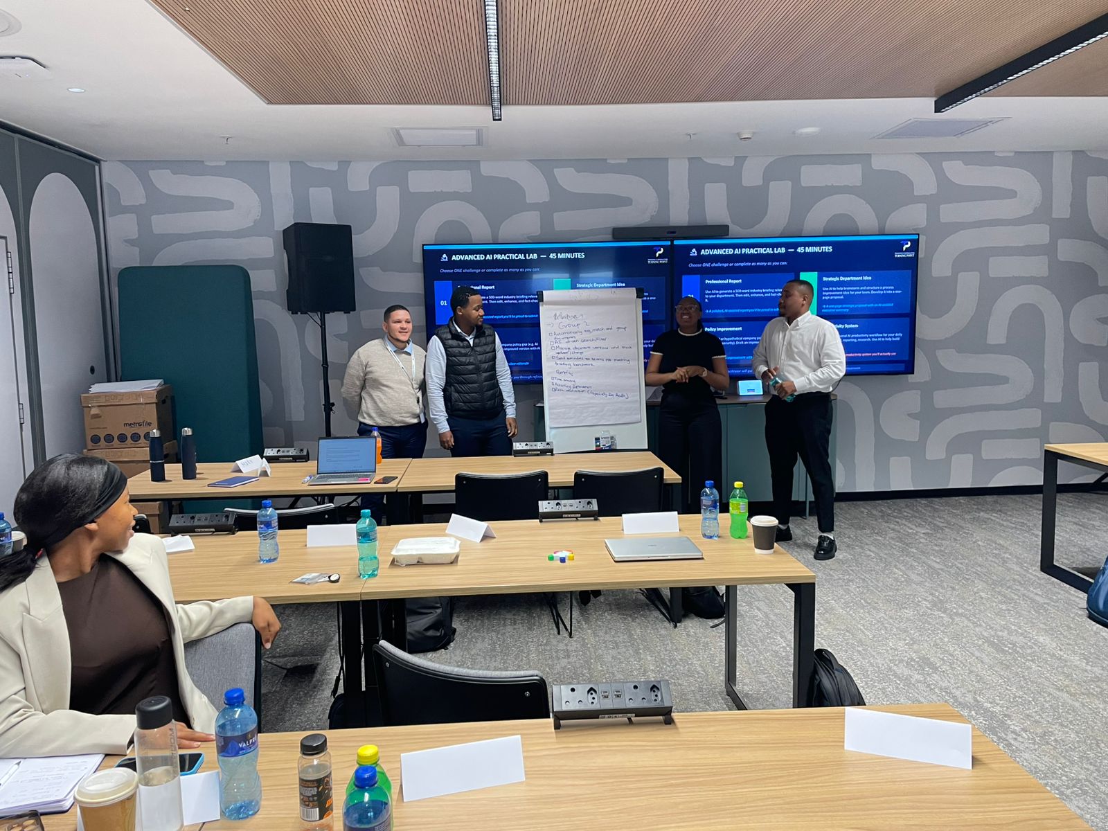 Government program participants engaging in a practical group exercise